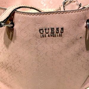 Light pink guess handbag with clutch